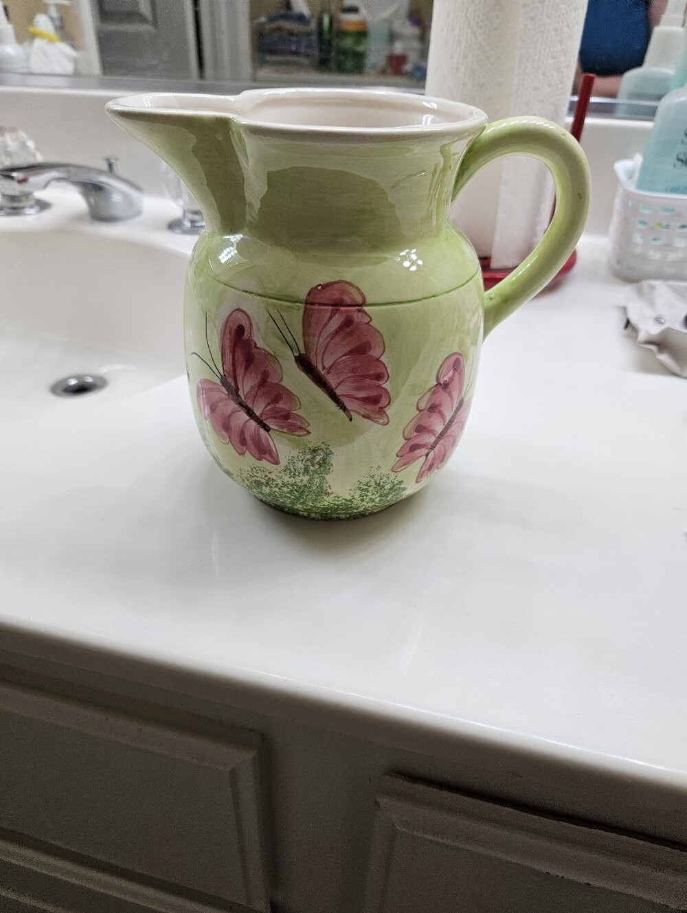 Hand-Painted Green Ceramic Pitcher with Pink Butterfly Motif